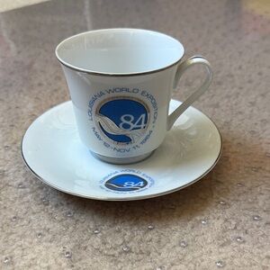 Louisiana World Exposition '84 Porcelain Cup & Saucer Set - White with Blue Logo